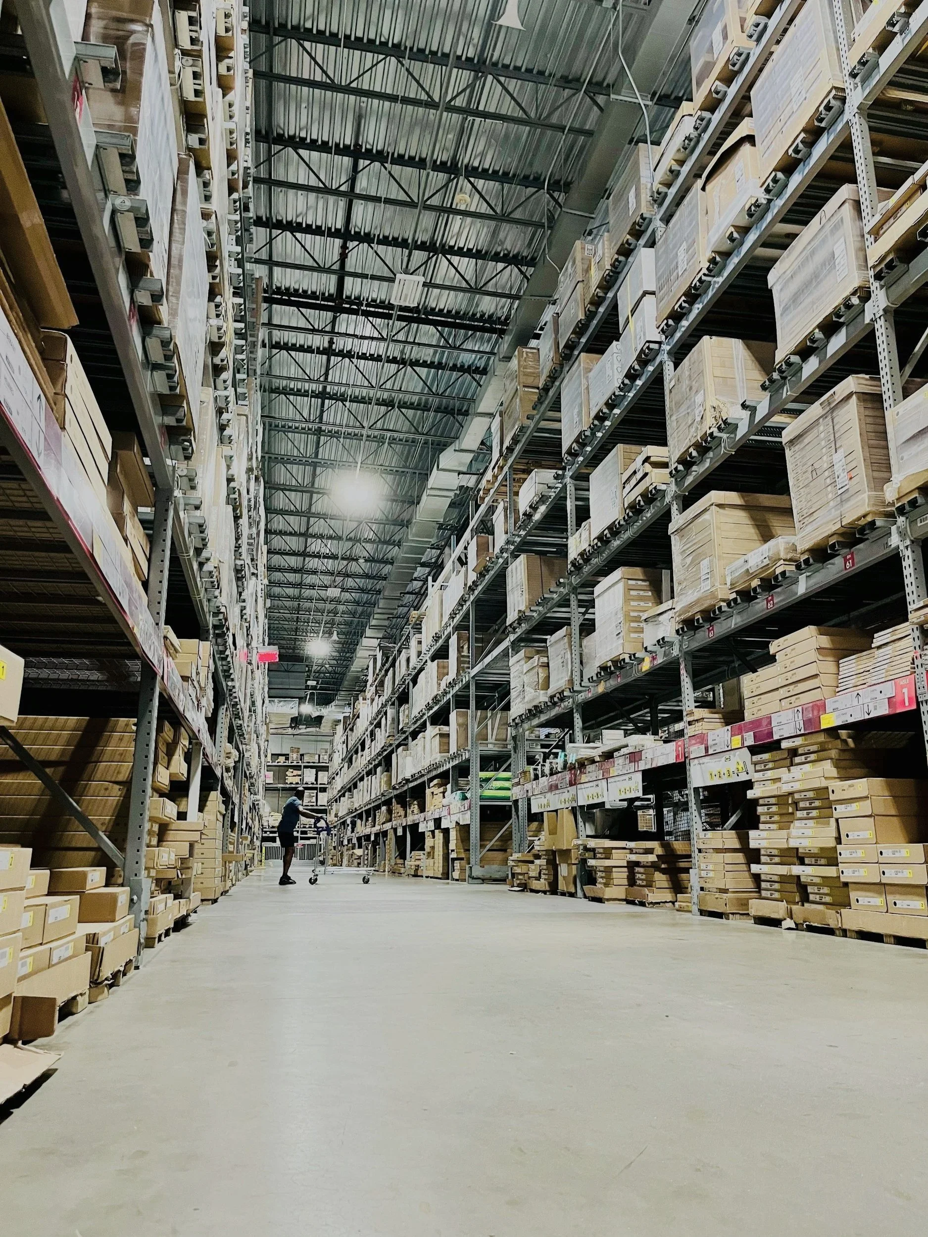 Large distribution center warehouse with high industrial racking and fulfillment operations
