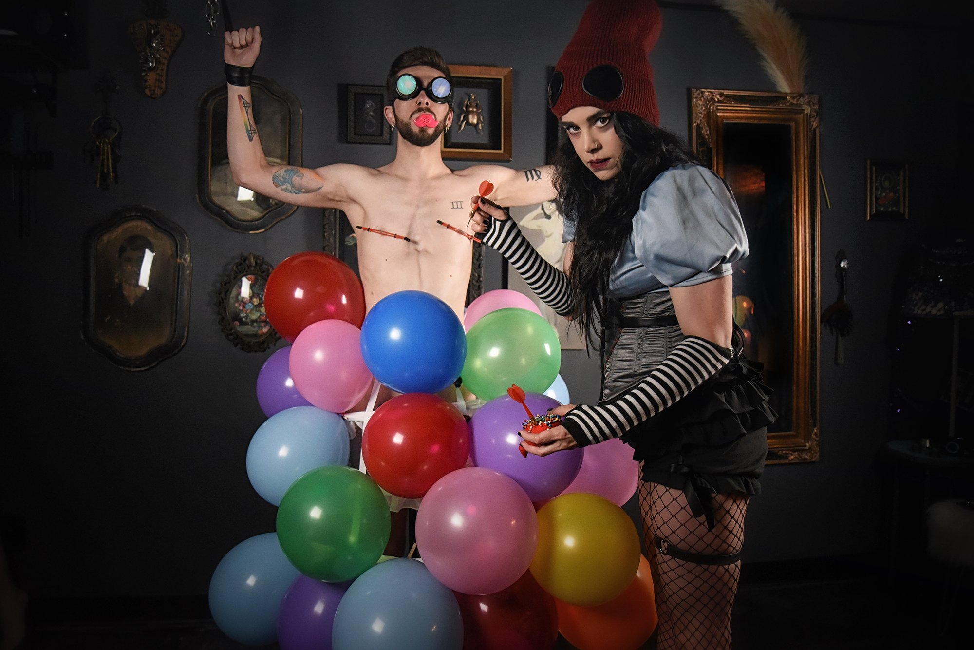 Balloon play, looning, looner, colorful balloons, FemDom, male submissive.