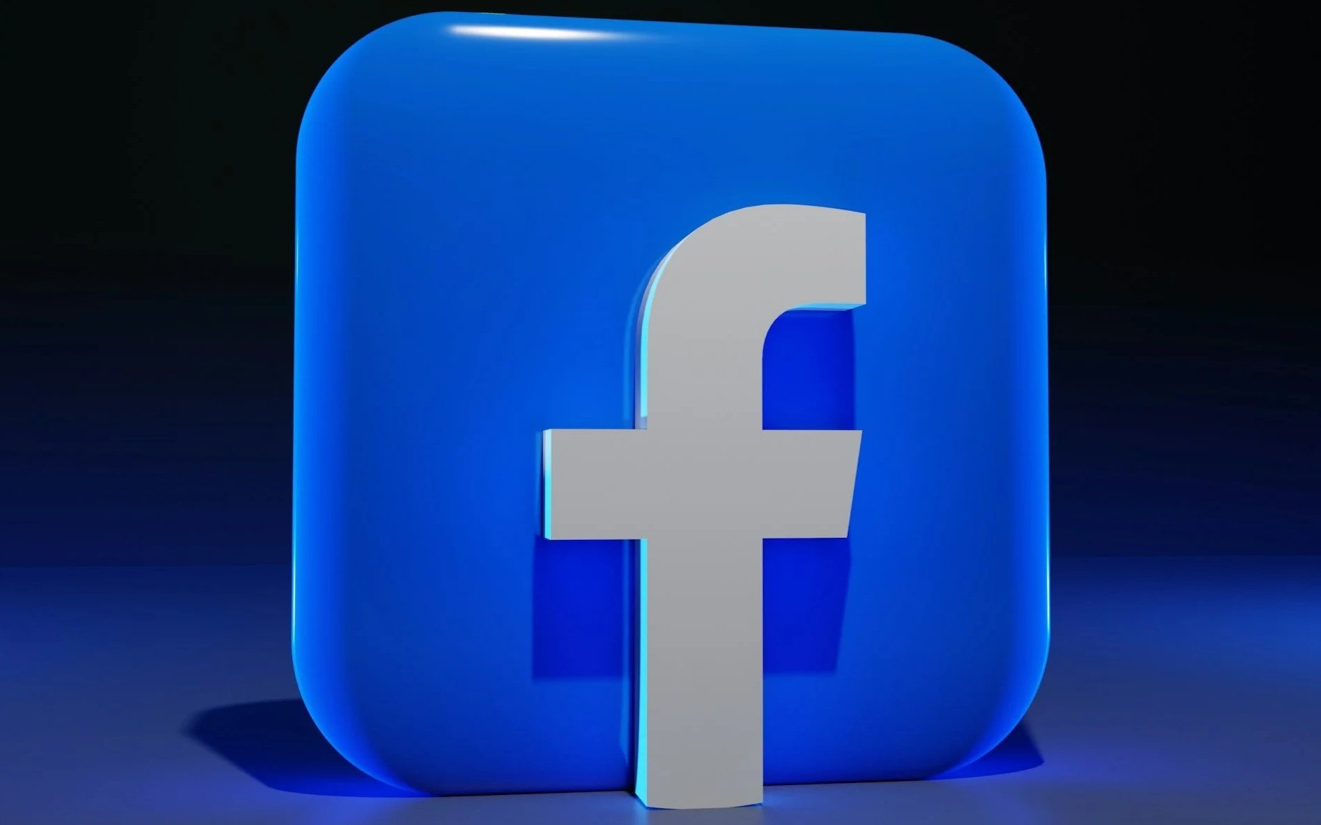 3D illustration of the Facebook logo, a white letter 'f' on a blue rounded square background with a subtle gradient, glowing edges, and shadows.