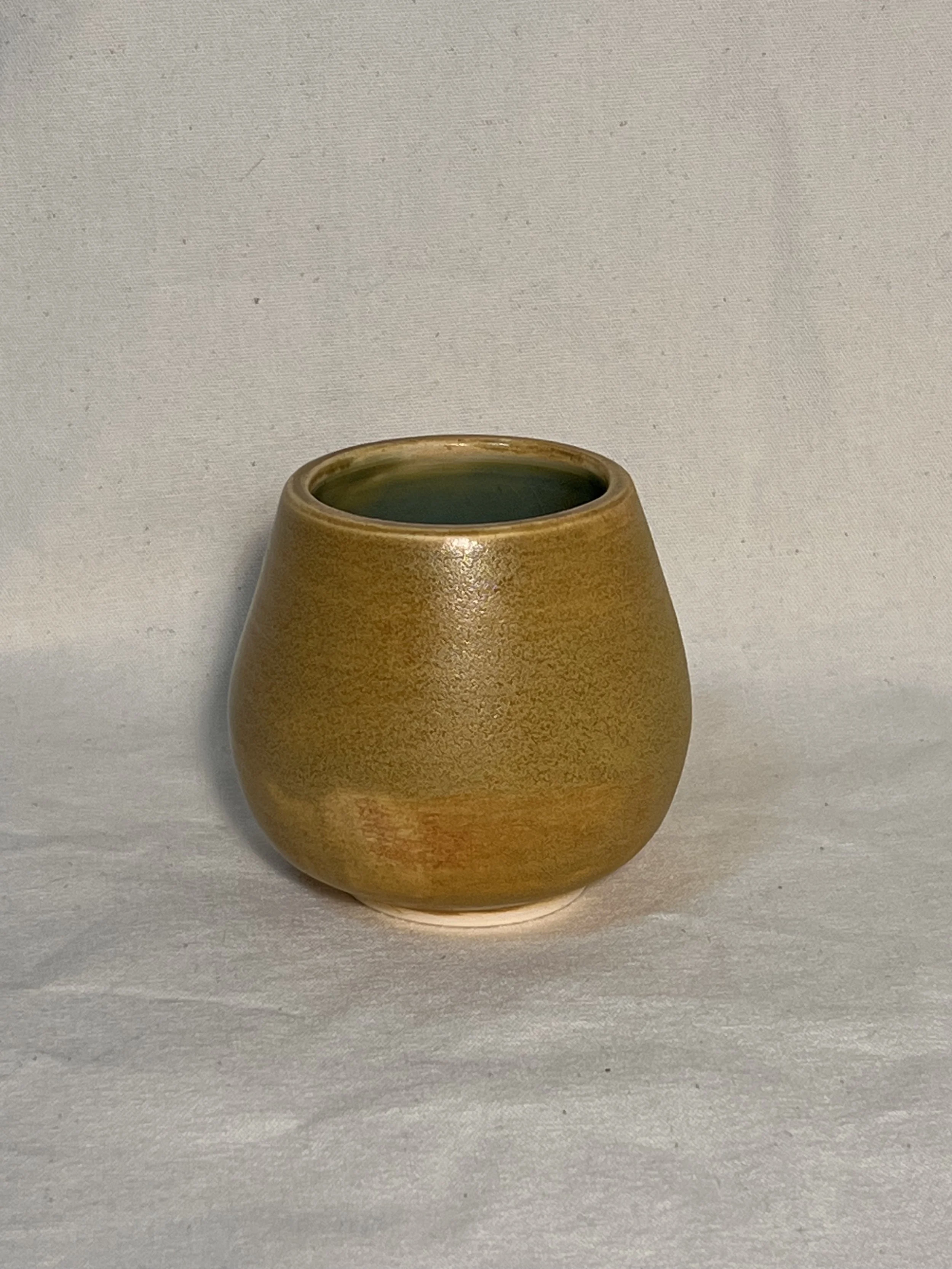 Small high-fired yellow mug with matte finish