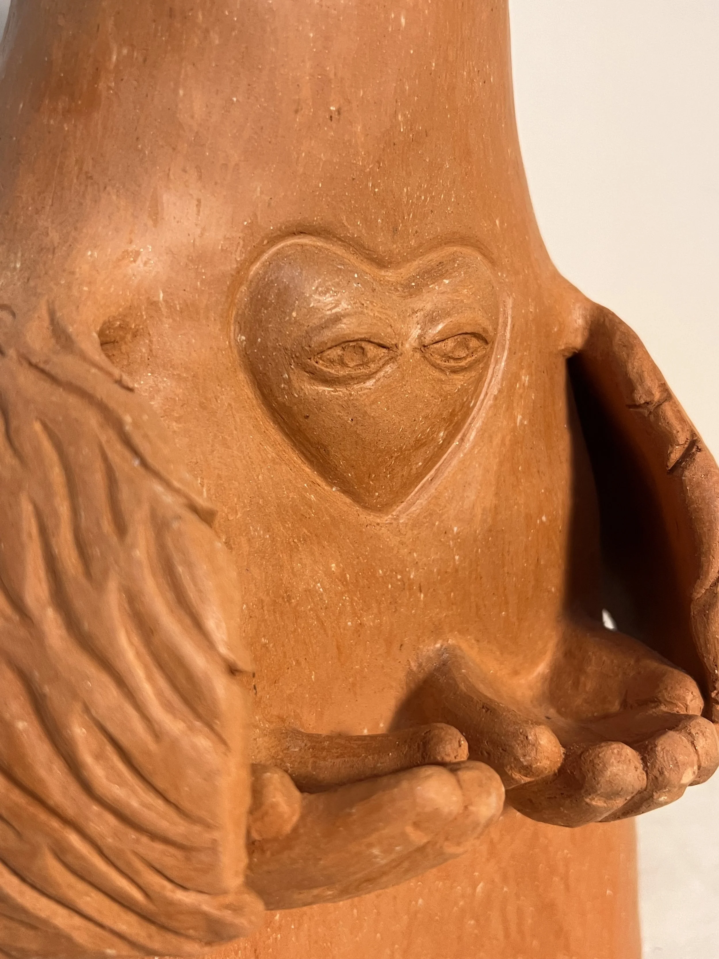 heart-creature-hands-wings-detail.jpg