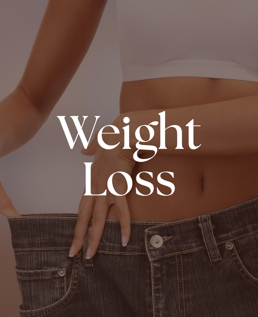 Conceptual photograph illustrating weight loss, showing a woman in a white top holding up a pair of jeans that are now much too large for her waist. White serif text reads 'Weight Loss' in the center.