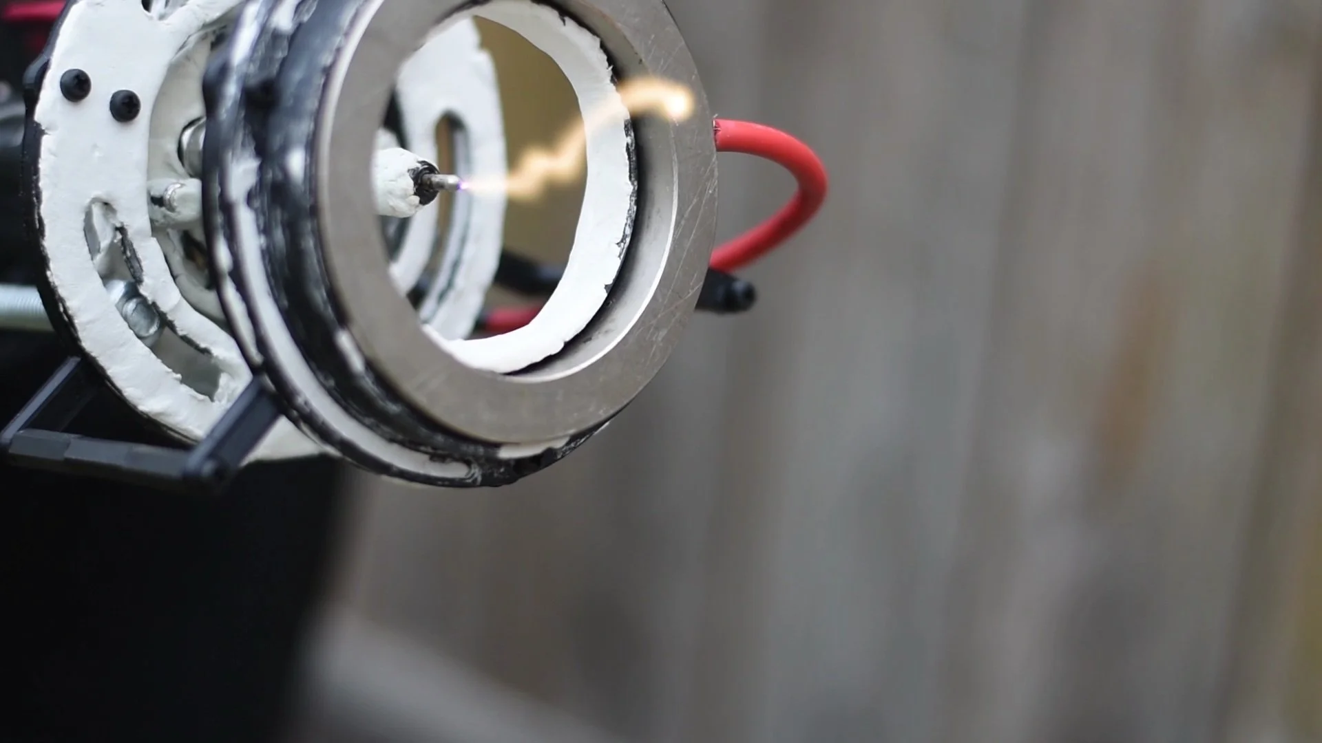 The first flamethrower utilized a 60,000V ignition system. However, the resulting plasma was highly unstable due to weak magnetic confinement and low current density.