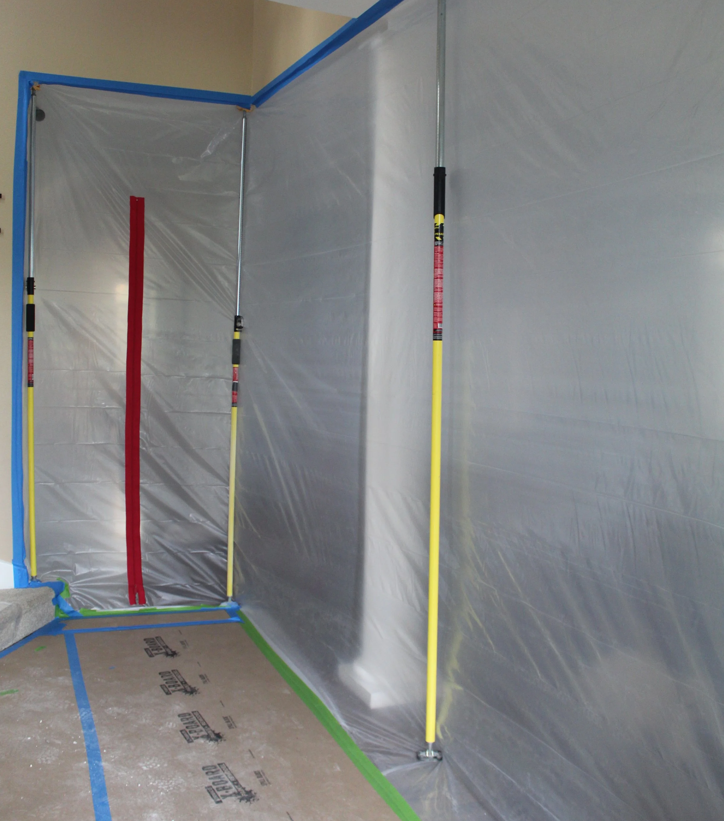 Professional whole home remodeling project in Bellevue, WA featuring dust containment barriers and clean construction practices by F&M Construction & Remodeling.
