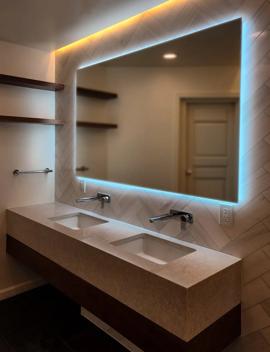 LED bathroom mirror lighting installation by F&M Construction & Remodeling, serving Bellevue, Seattle, and the Eastside.
