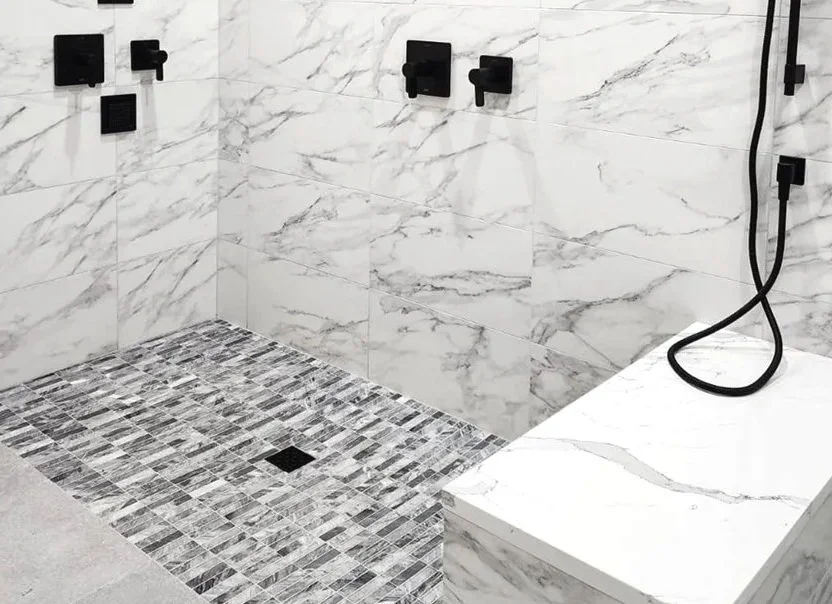 Marble mosaic shower floor tile installation completed by F&M Construction & Remodeling on Mercer Island, WA, featuring custom shower flooring, luxury tile installation, and premium bathroom remodeling throughout Bellevue, Seattle, and the Eastside.