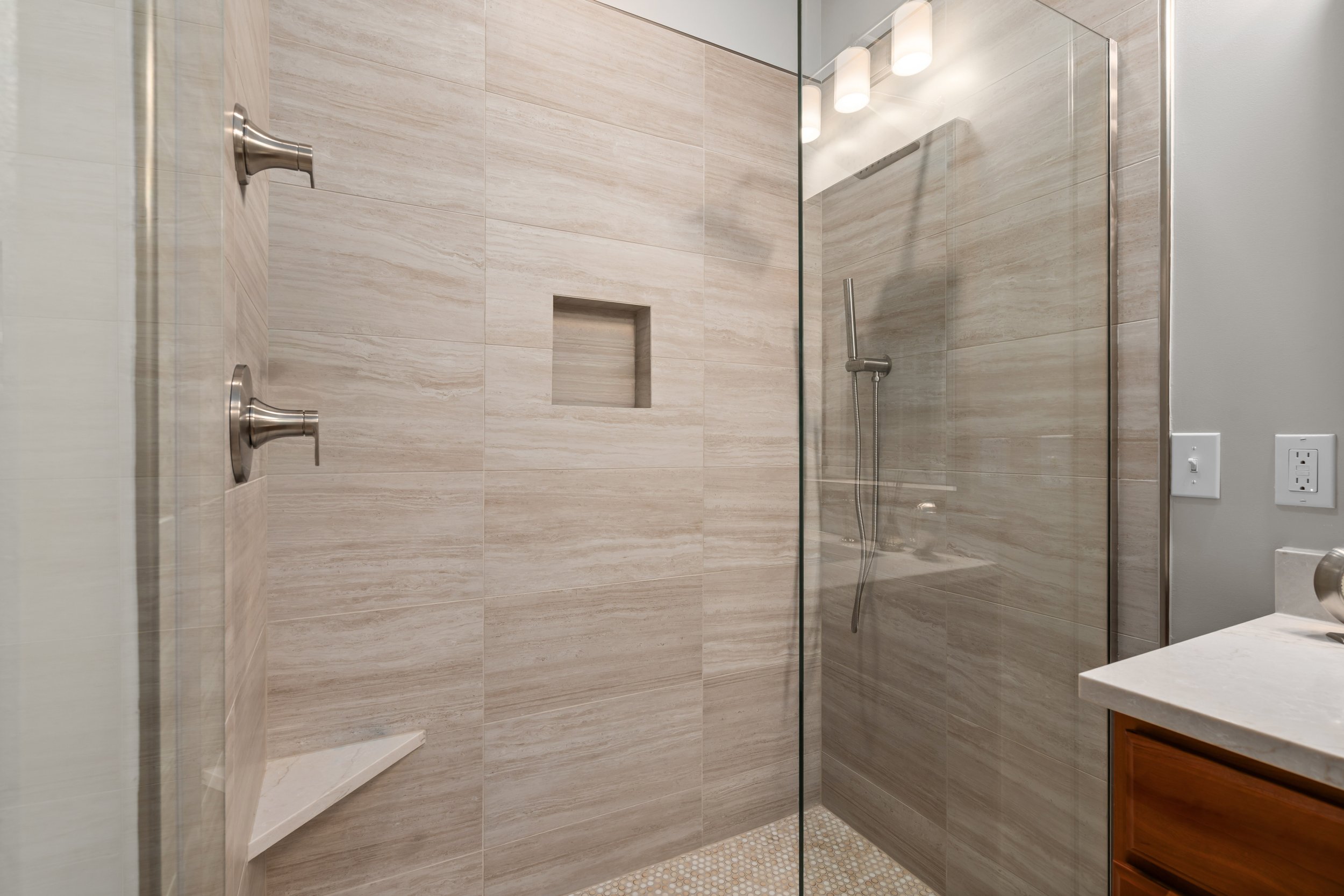 Mollie House Transformation — remodeled bathroom with walk-in tile shower and glass enclosure, Redmond interior remodel