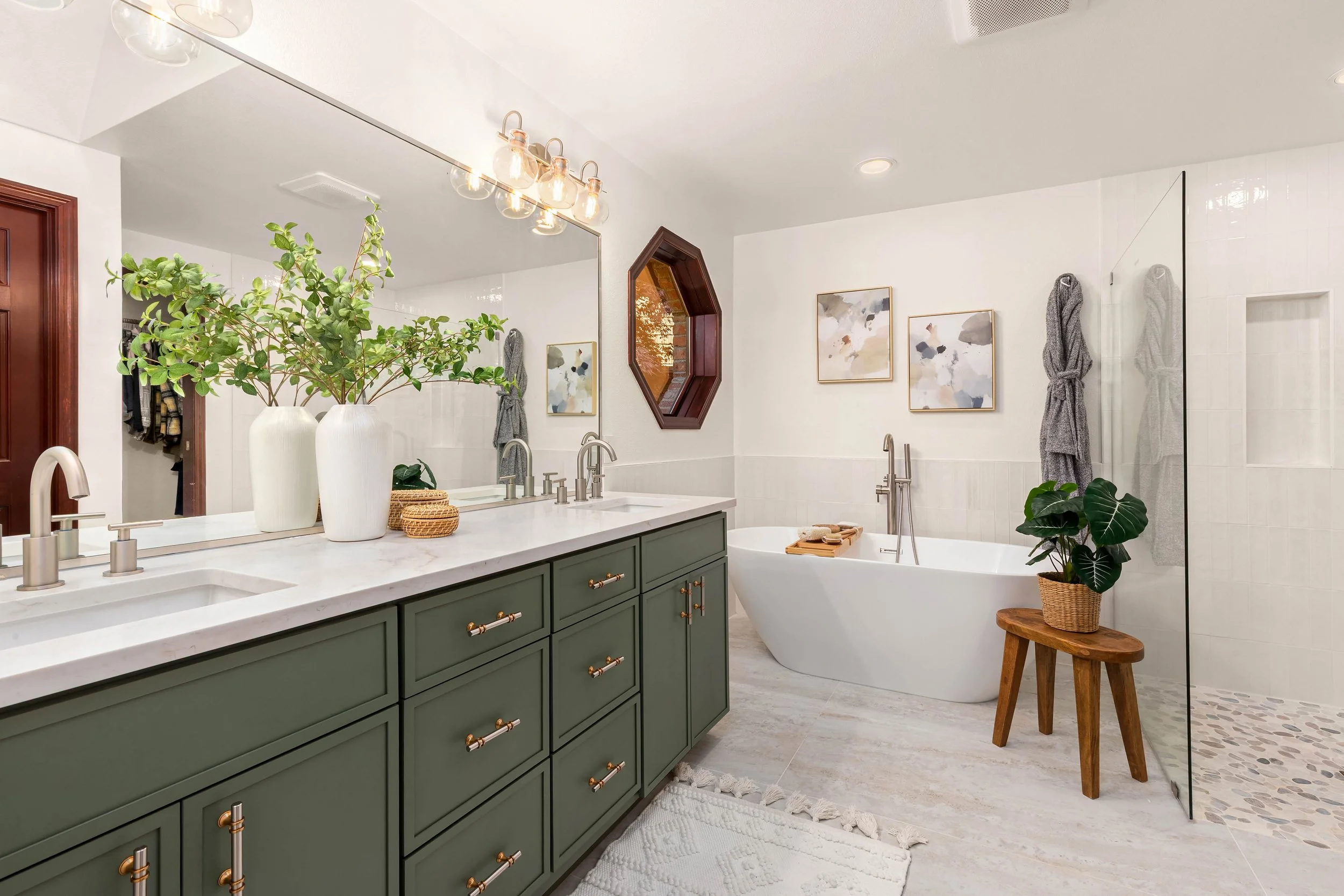 Custom bathroom remodel completed by F&M Construction & Remodeling in Kirkland, WA, featuring a double vanity, quartz countertops, luxury soaking tub, and high-end residential bathroom renovation.