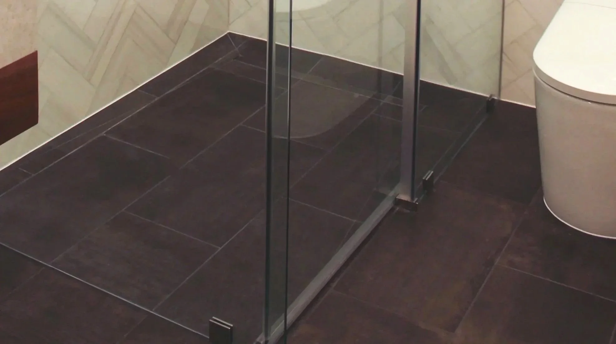 Dark tile flooring used in a Mercer Island Bathroom Remodel.
