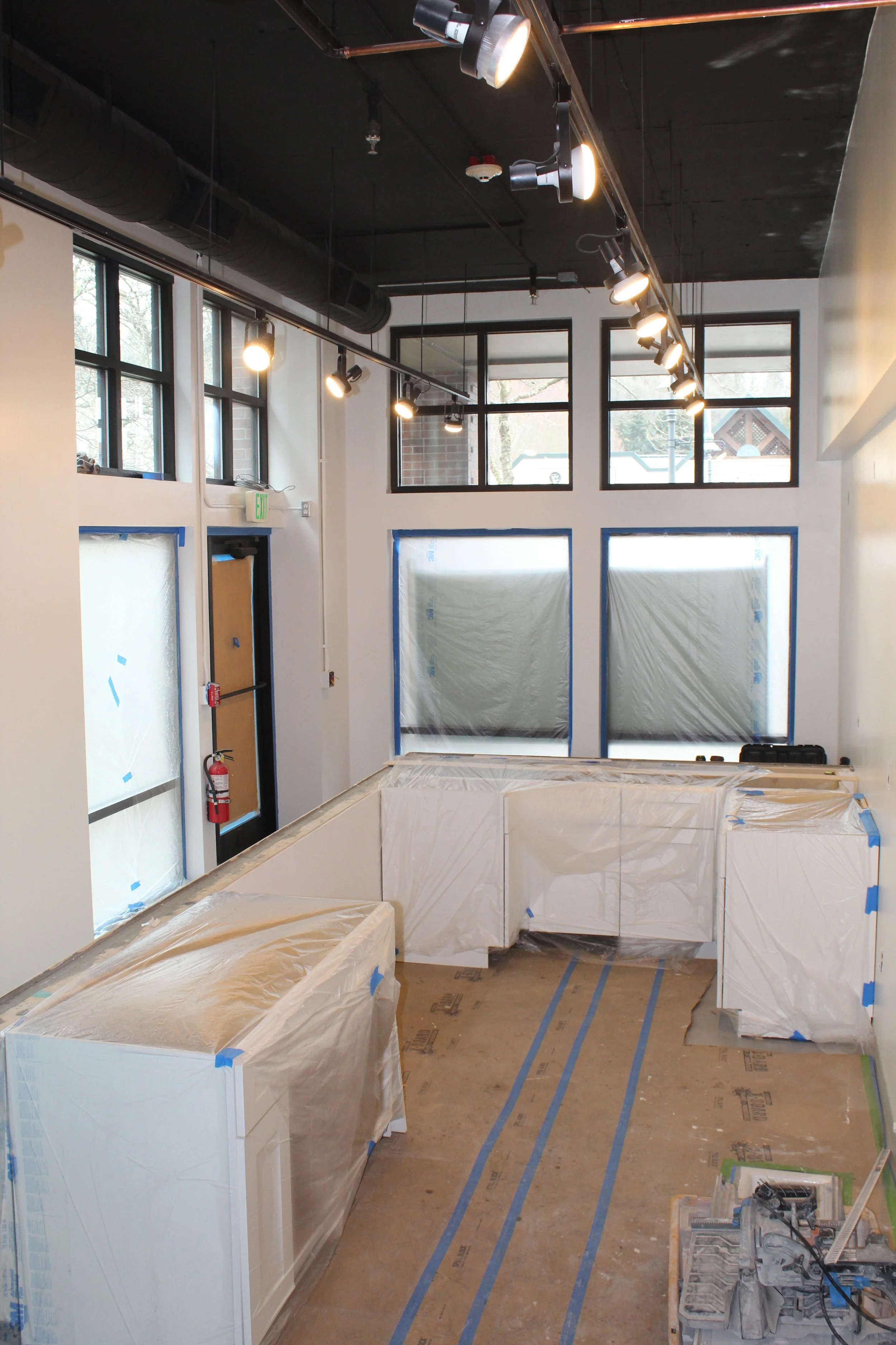 Restaurant tenant improvement completed by F&M Construction & Remodeling at Just Poké in Bellevue, WA, featuring commercial construction, interior renovations, and restaurant build-out services for Seattle and the Eastside.