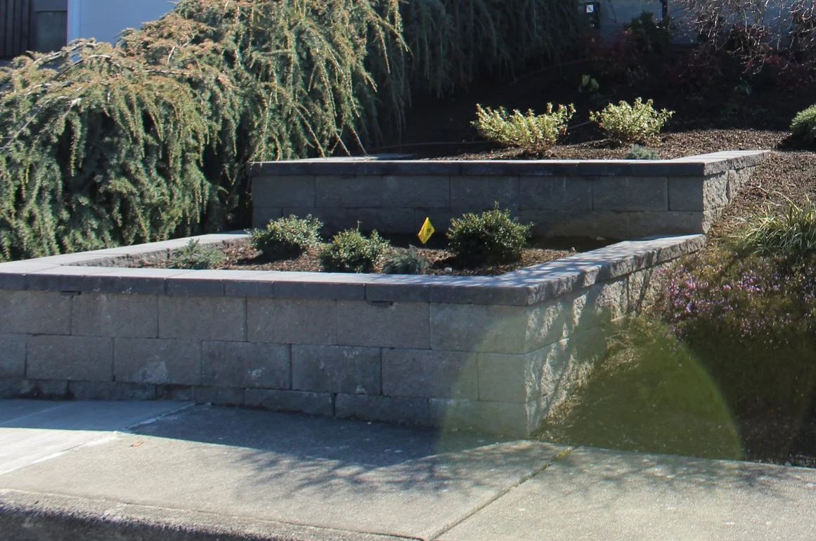 Landscape retaining wall installation by F&M Construction & Remodeling in Bellevue, WA, serving Seattle and the Eastside.