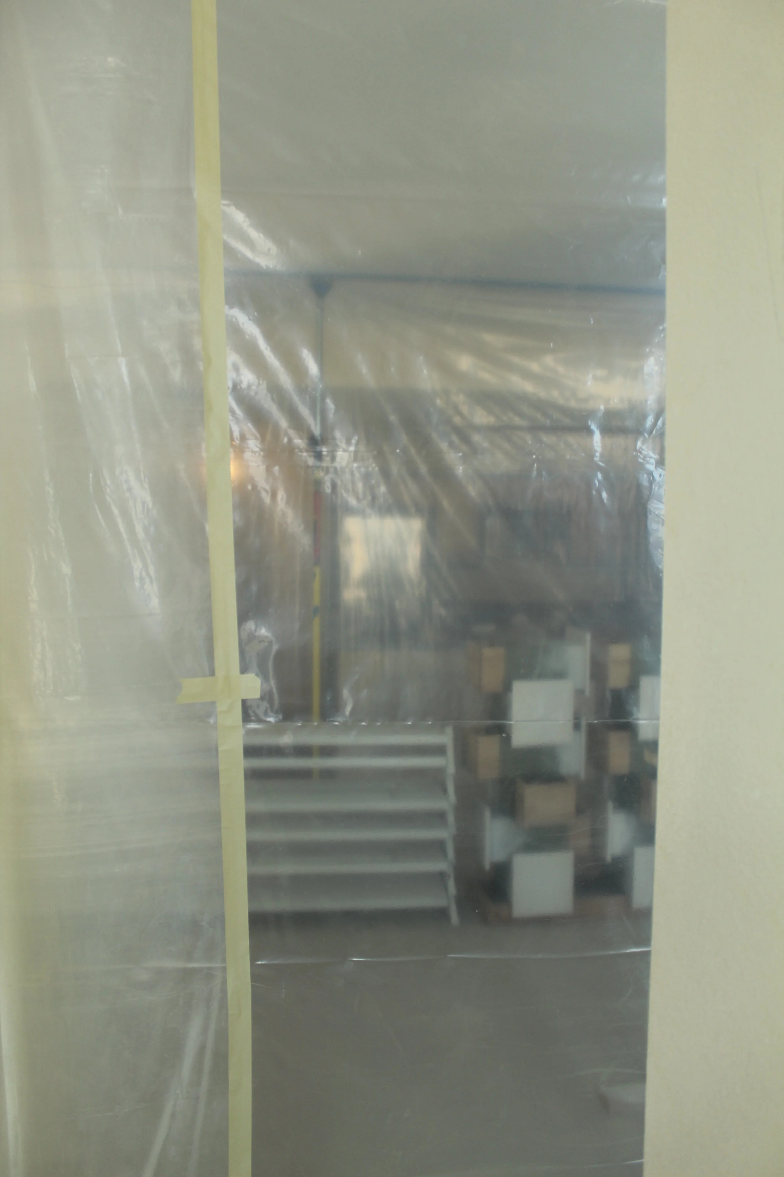 Dust containment for a professional painting project by F&M Construction & Remodeling, serving Bellevue, Seattle, and the Eastside.