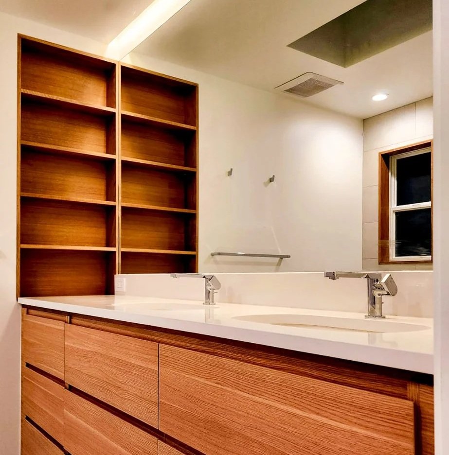 Custom bathroom vanity and built-in shelving completed by F&M Construction & Remodeling in Kirkland, WA, featuring premium finish carpentry, floating shelves, and luxury bathroom remodeling serving Bellevue, Seattle, and the Eastside.