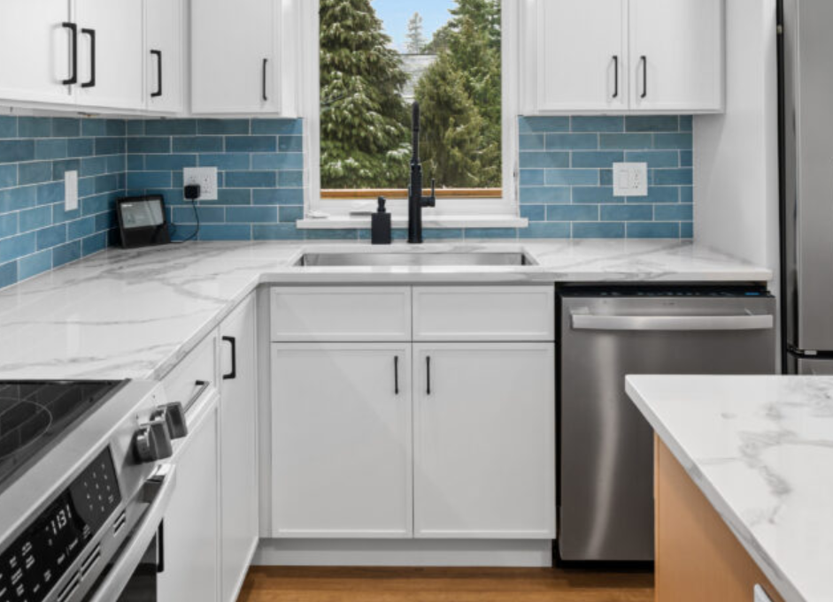 Kitchen sink and faucet installation completed by F&M Construction & Remodeling in Seattle, WA, featuring custom cabinetry, premium plumbing fixtures, and professional kitchen remodeling for Bellevue, Seattle, and the Eastside.
