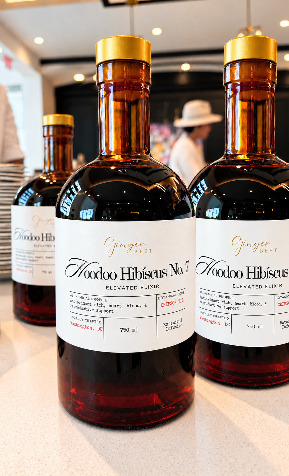 Hoodoo Hibiscus Elixir Bottle Trio.png