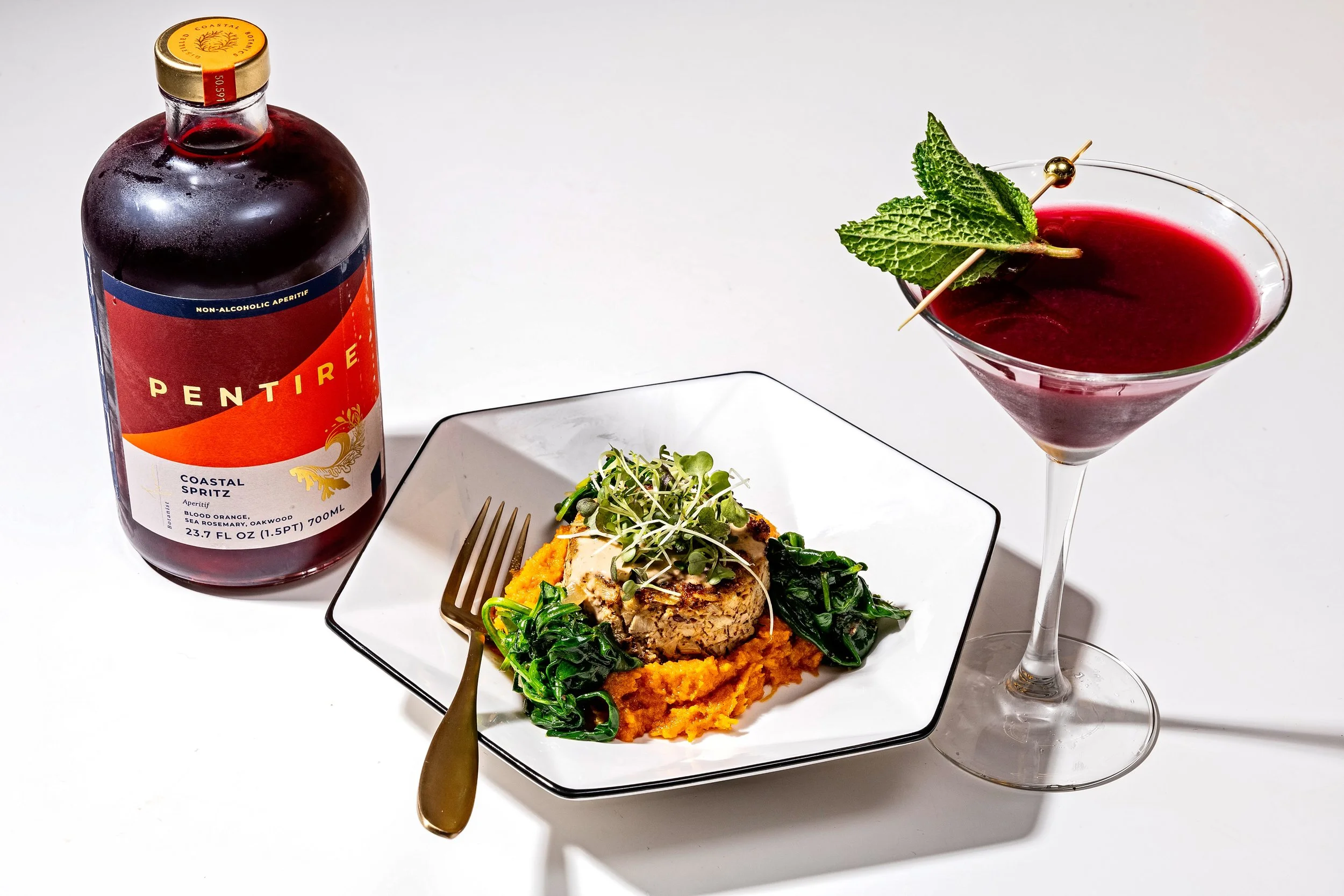 Luxury Plant-based Crab cake entree and non alcoholic cocktail made with Gingerbēet, elevated elixir Gingerbēet Bliss No. 9