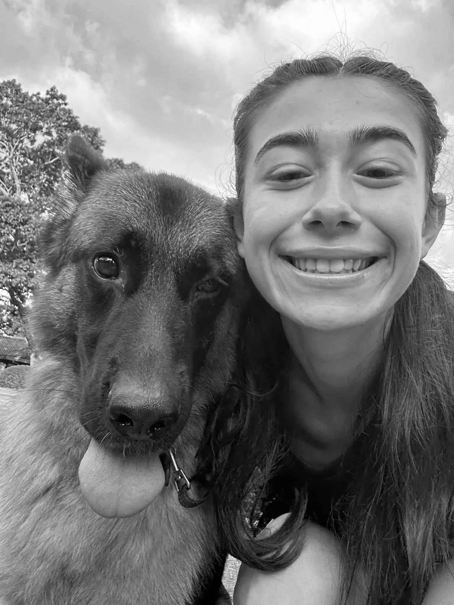 Sarena headshot with dog