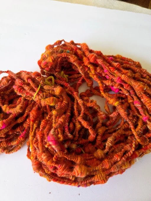 Hand Spun orange coiled yarn