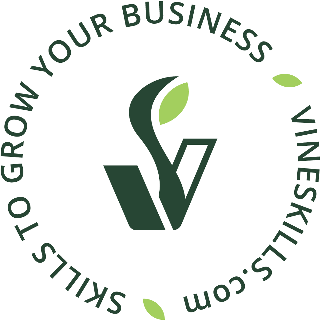 Circular logo with green text that says 'VineSkilling.com Grow Your Business' surrounding a stylized green and dark green leaf design.