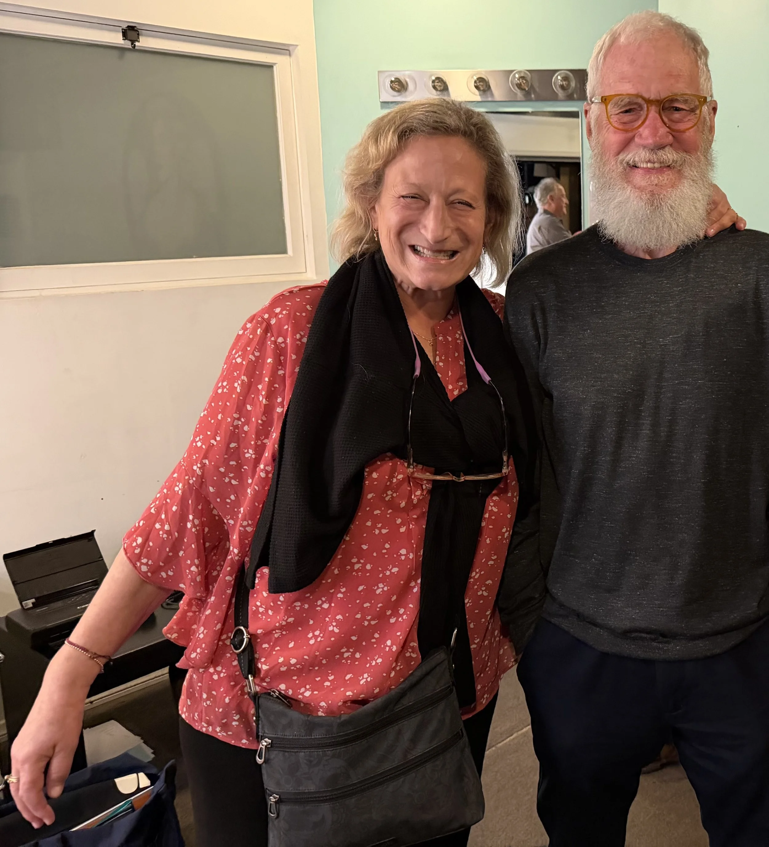 photo of Madeleine Smithberg with David Letterman, 2026