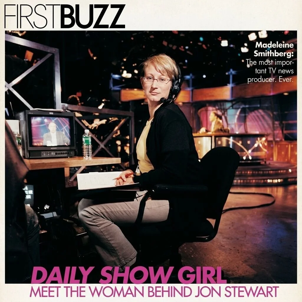 Madeline Smithberg sits at a news desk with headphones on, in front of a small monitor showing her image, in a TV studio setting. The cover features text about her as a TV news producer, with the headline 'Daily Show Girl' and tagline 'Meet the woman behind Jon Stewart'.