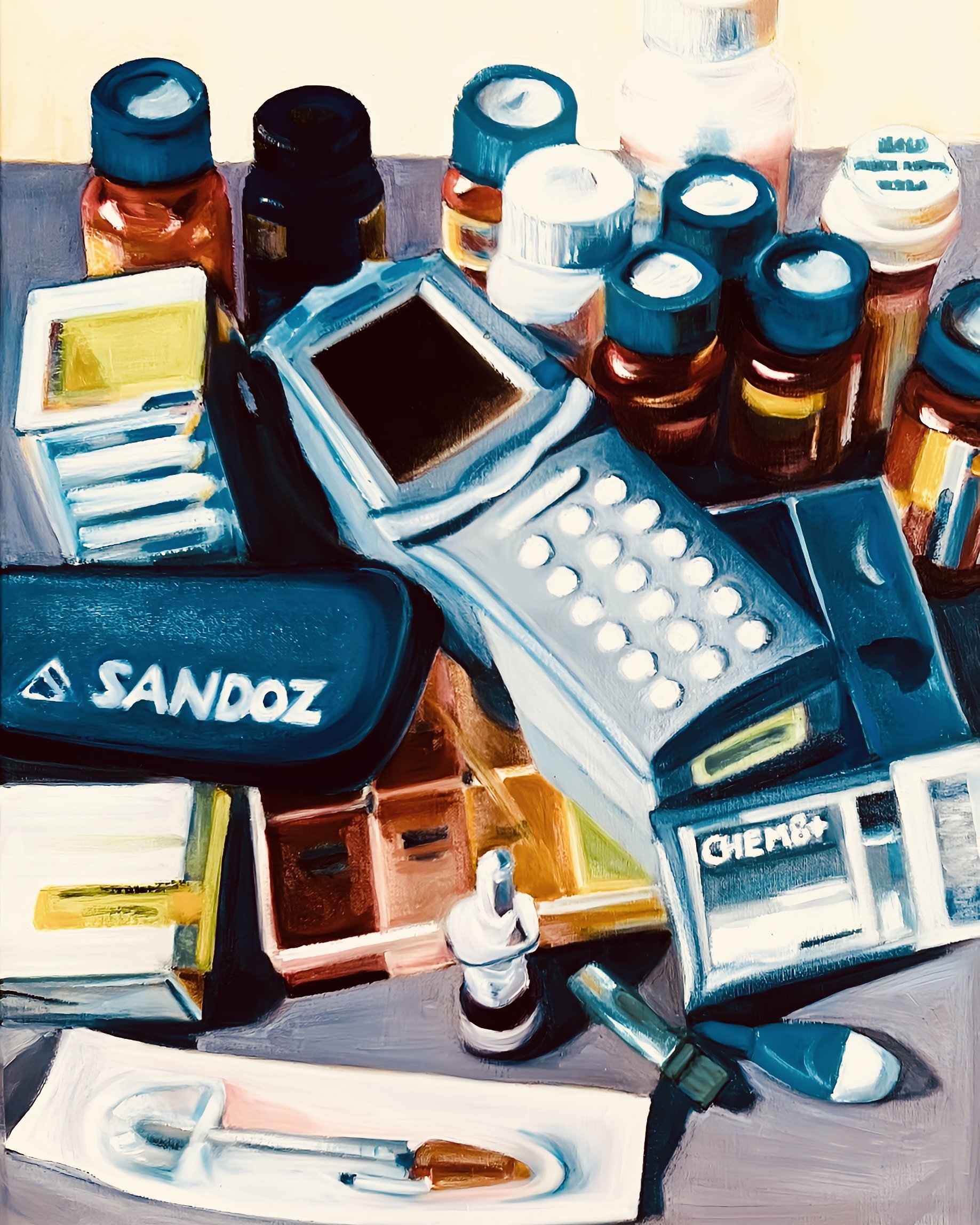 A collection of medicine bottles, pills, and medication boxes on a surface with some tablets and capsules displayed.