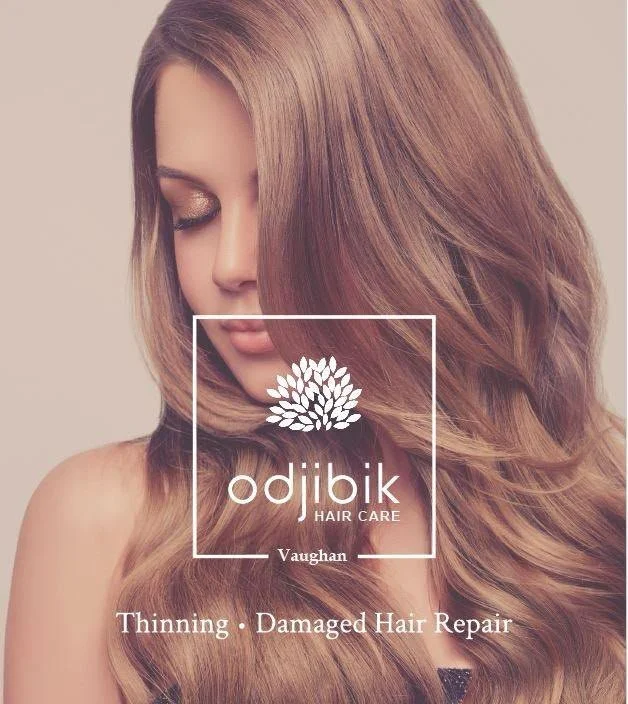 A woman with long, wavy, light brown hair promotes Odjibik Hair Care by Vaughan, which offers hair thinning and damaged hair repair services.
