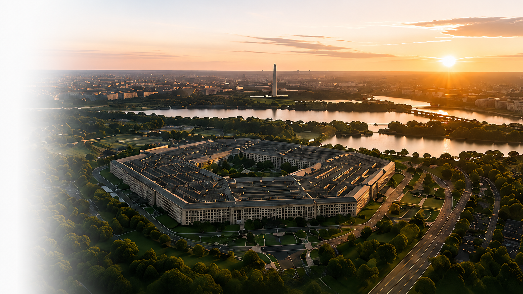 Aerial view of the United States Capitol building and surrounding park area in Washington, D.C. at sunset.
