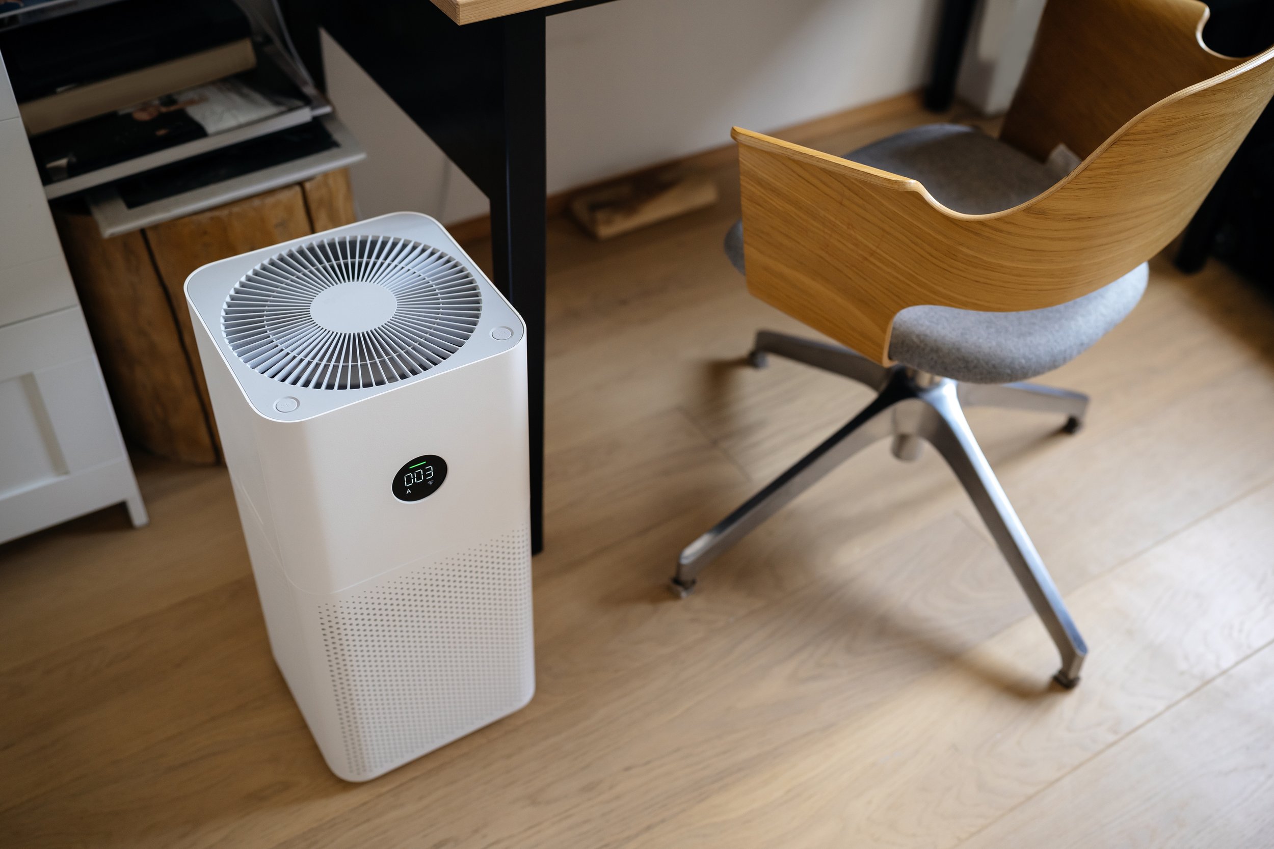 air purifier at desk.jpeg