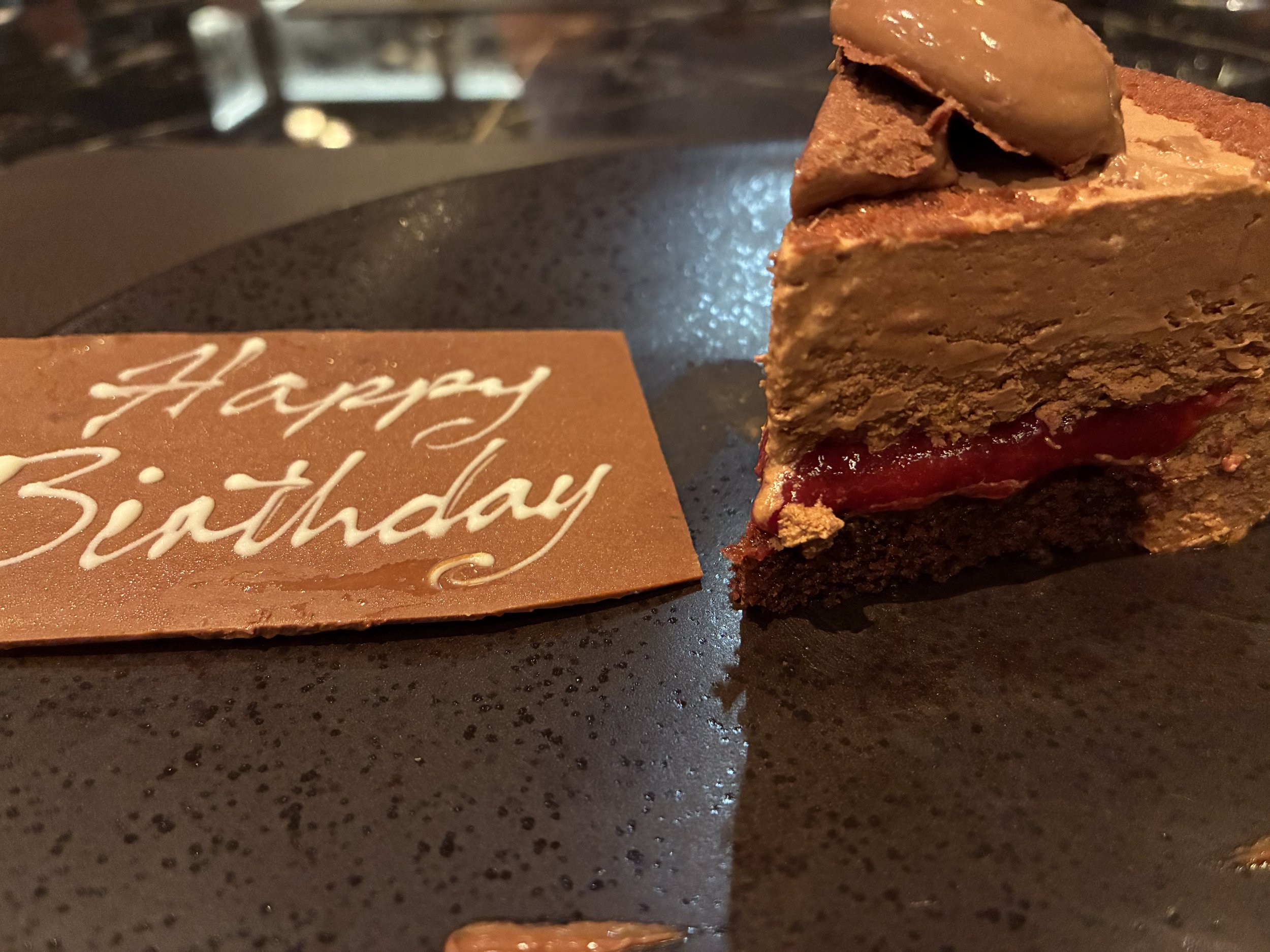 A birthday cake served on board.