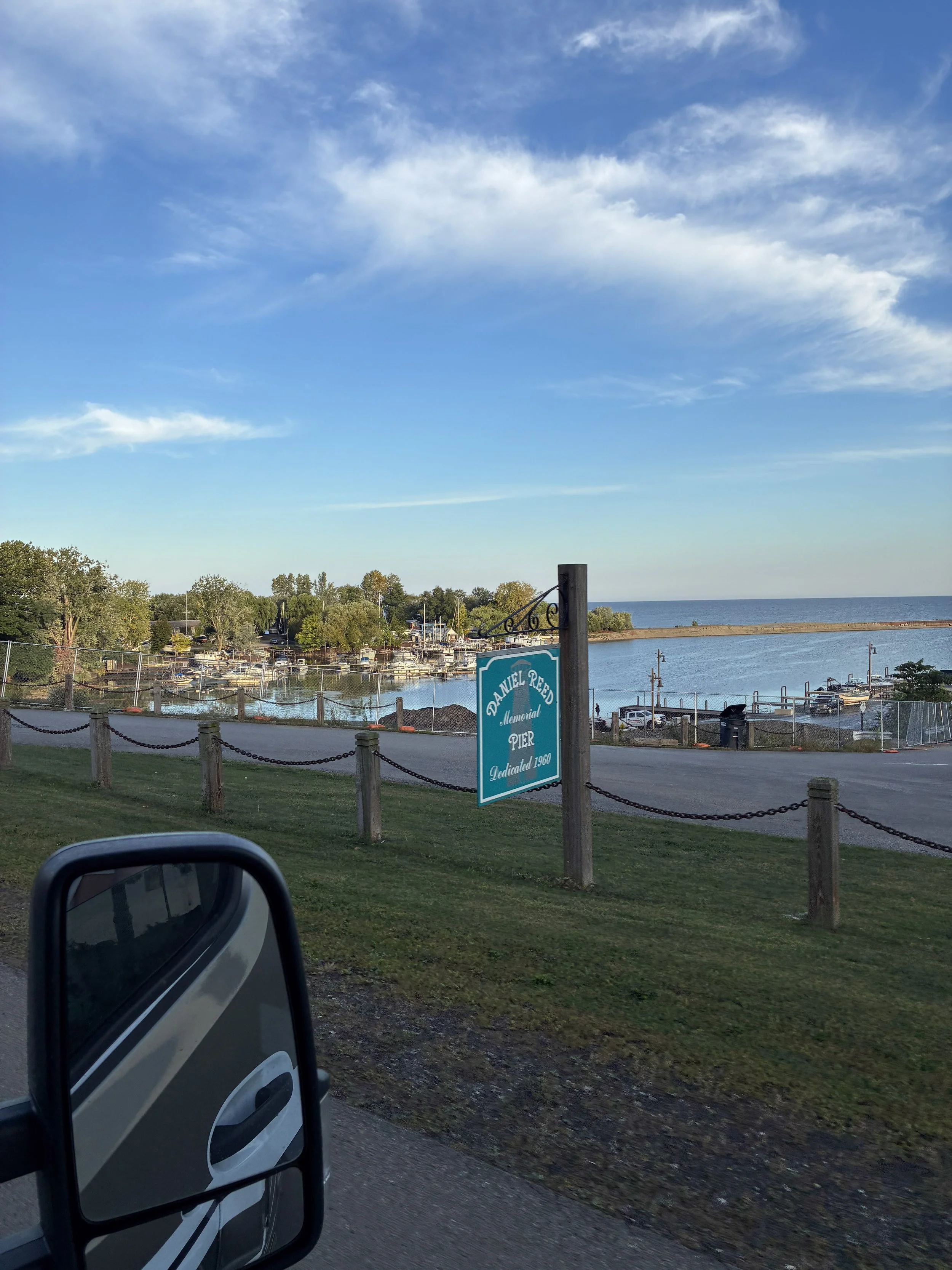 The Daniel Reed Memorial Pier sign by the harbor.