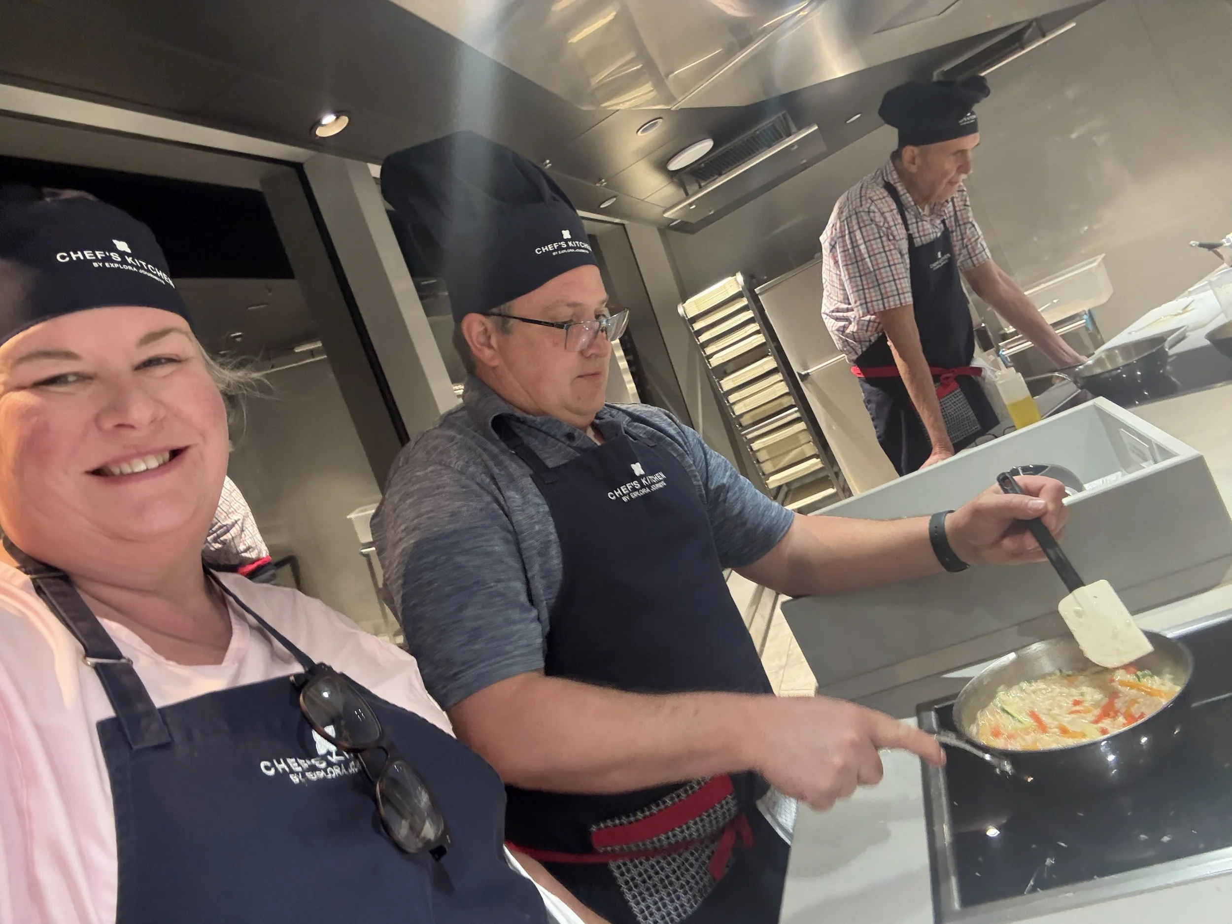 A cooking class in the Chef's Kitchen aboard Explora II.