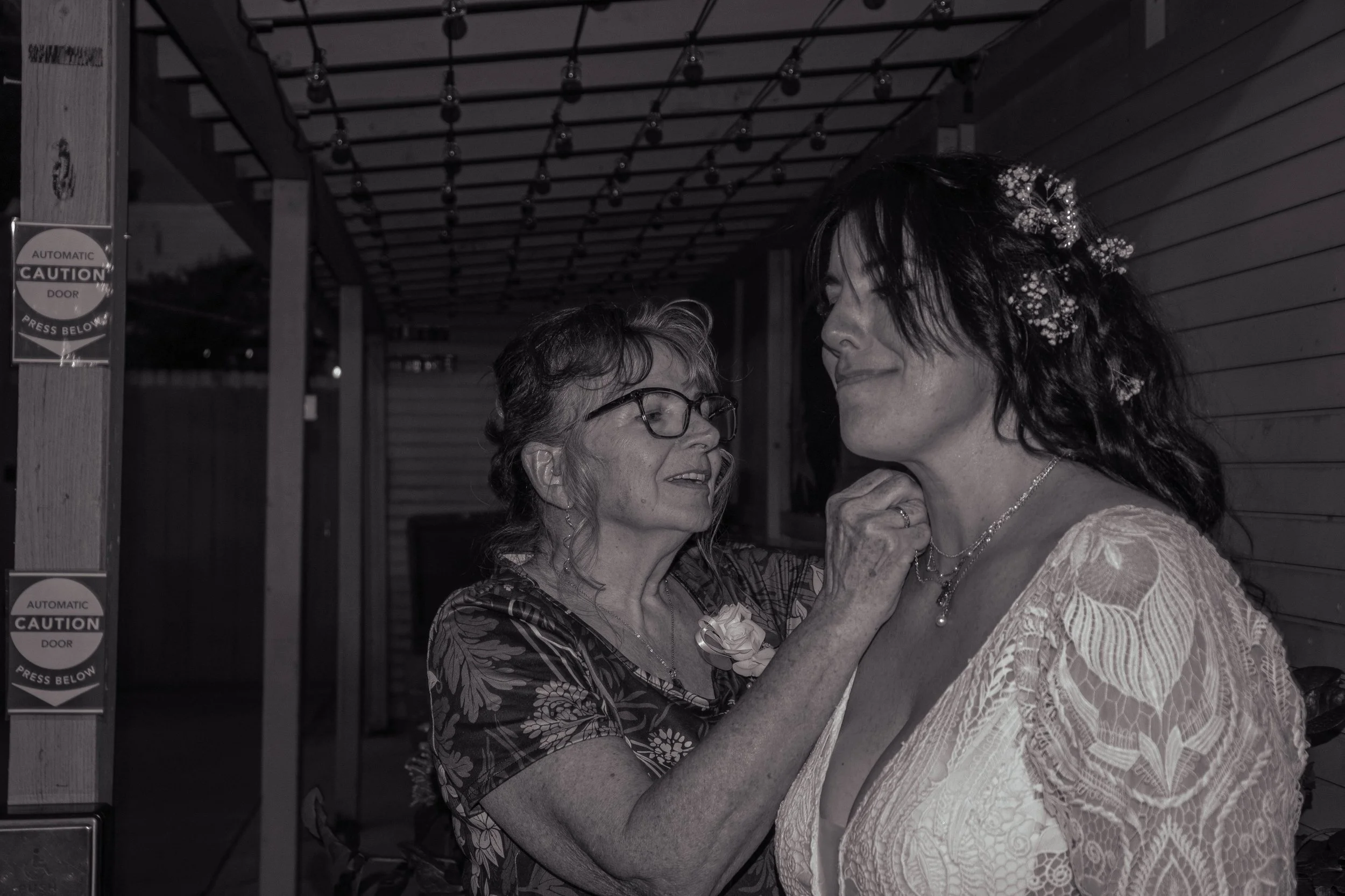 A special moment between a mother and her daughter on her wedding day.