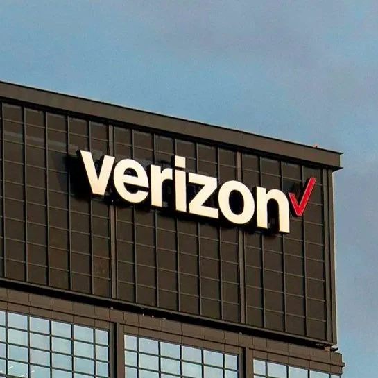 Verizon building logo on a modern office building exterior.