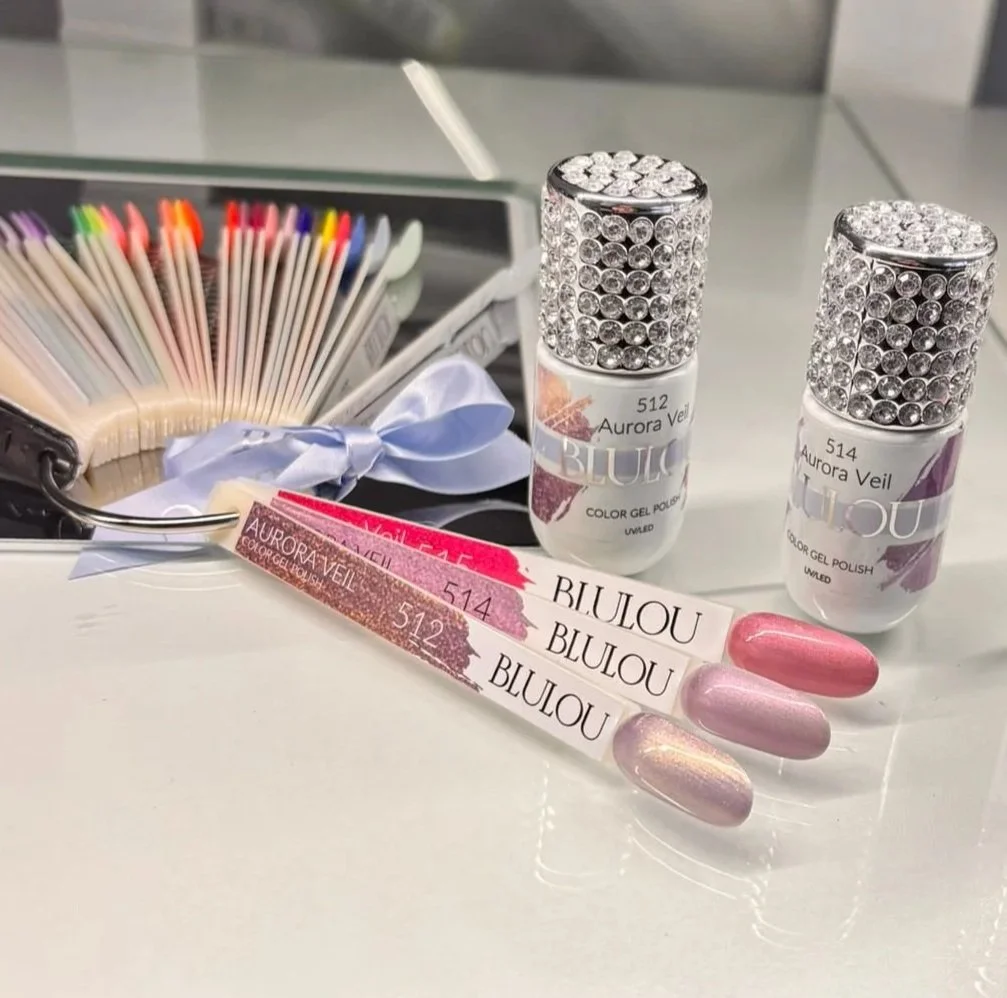 Gel polish colour swatches and Blulou Aurora Veil bottles on display at K.BeautyStudio, a nail and beauty studio in Aberdeen.