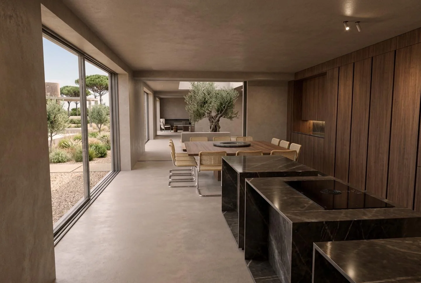 Modern dining area with large windows overlooking a garden, featuring a wooden dining table with eight chairs, a marble kitchen island, and a large tree outside.