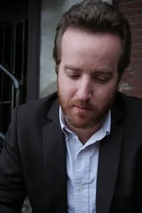 Joe Stickley outside Meshuggah Café in University City, Missouri.