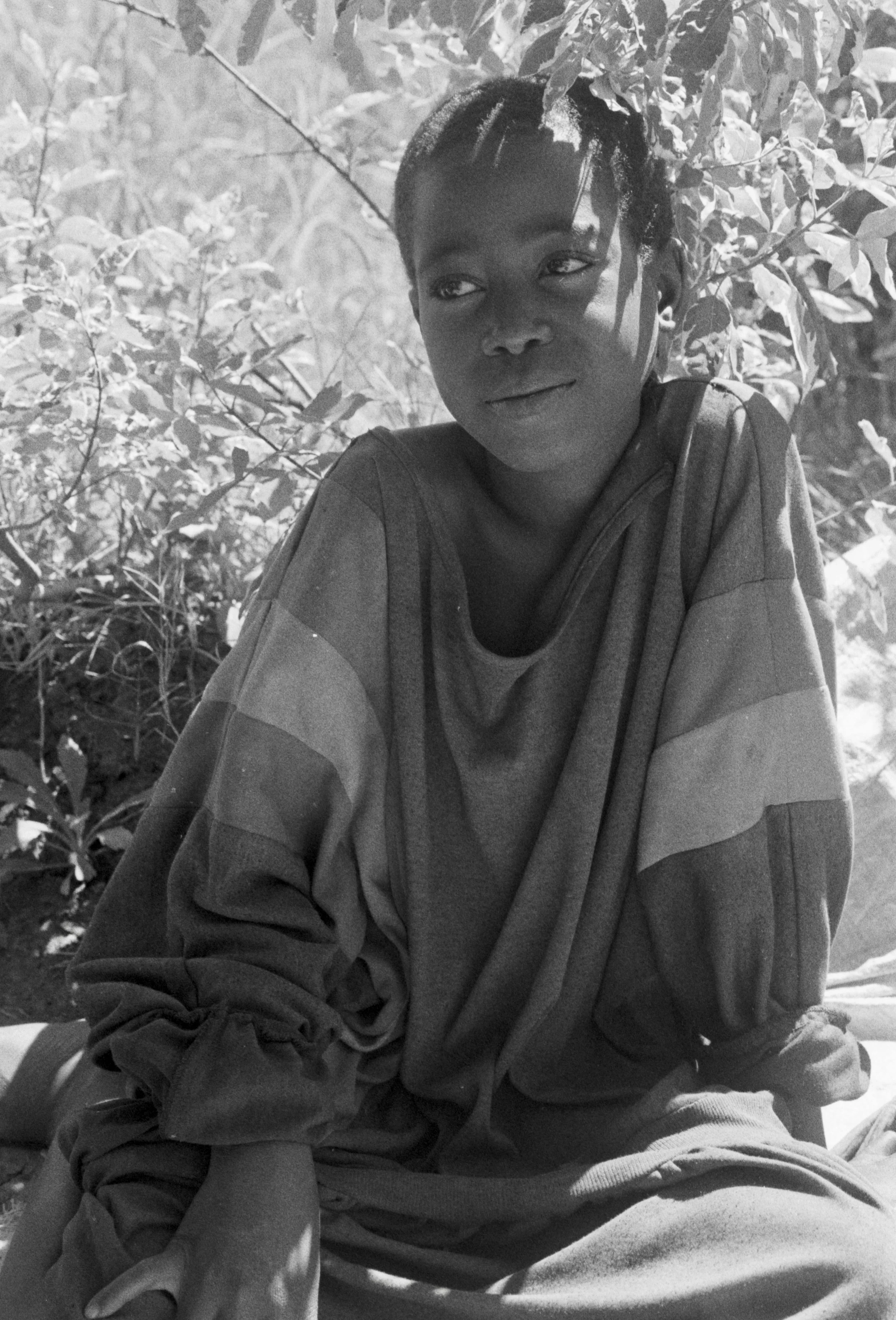 Boy under tree Zambia