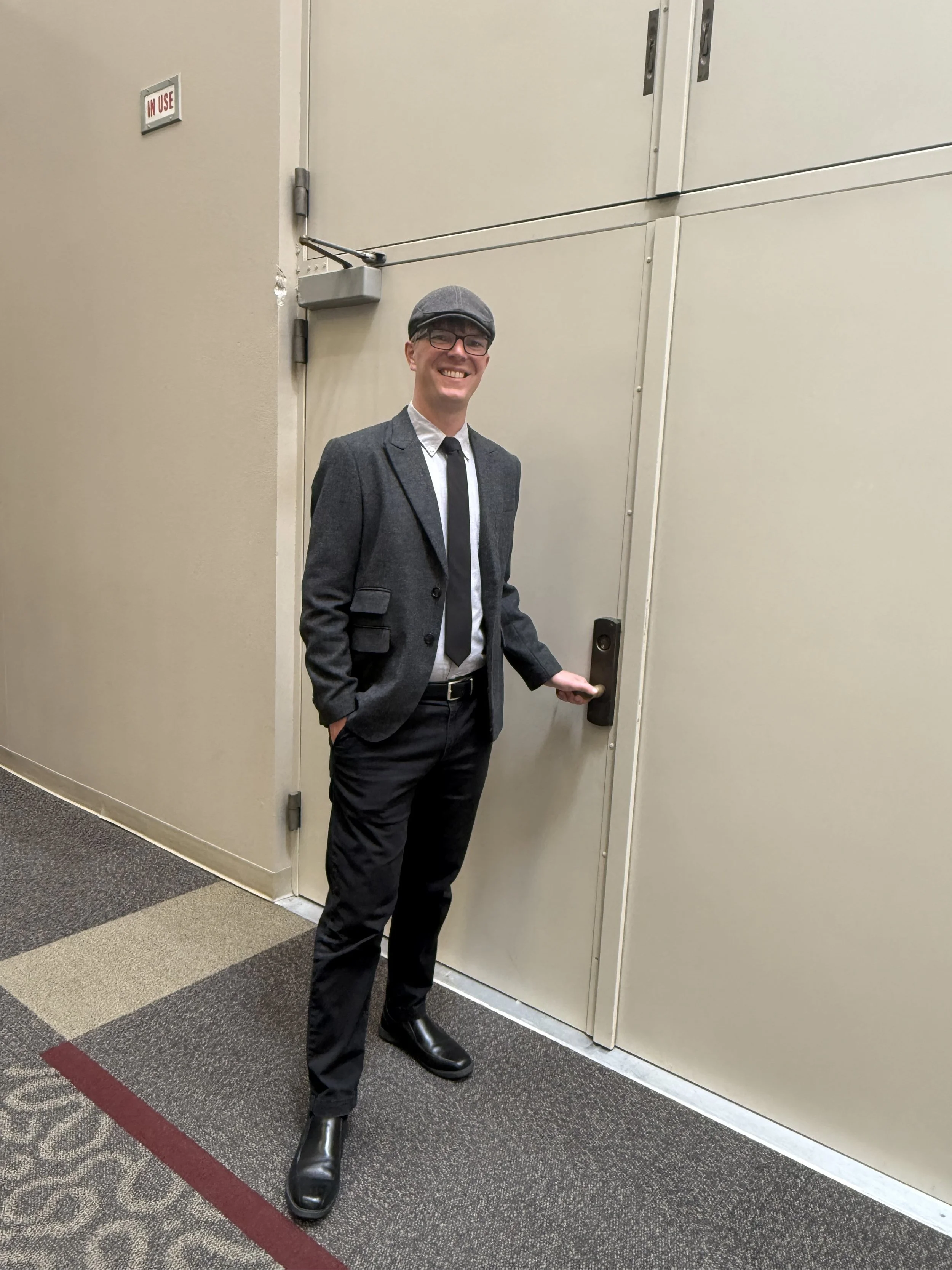 Dr. Kyle Rudick, about to walk into a podcast studio, to talk about publishing academic research