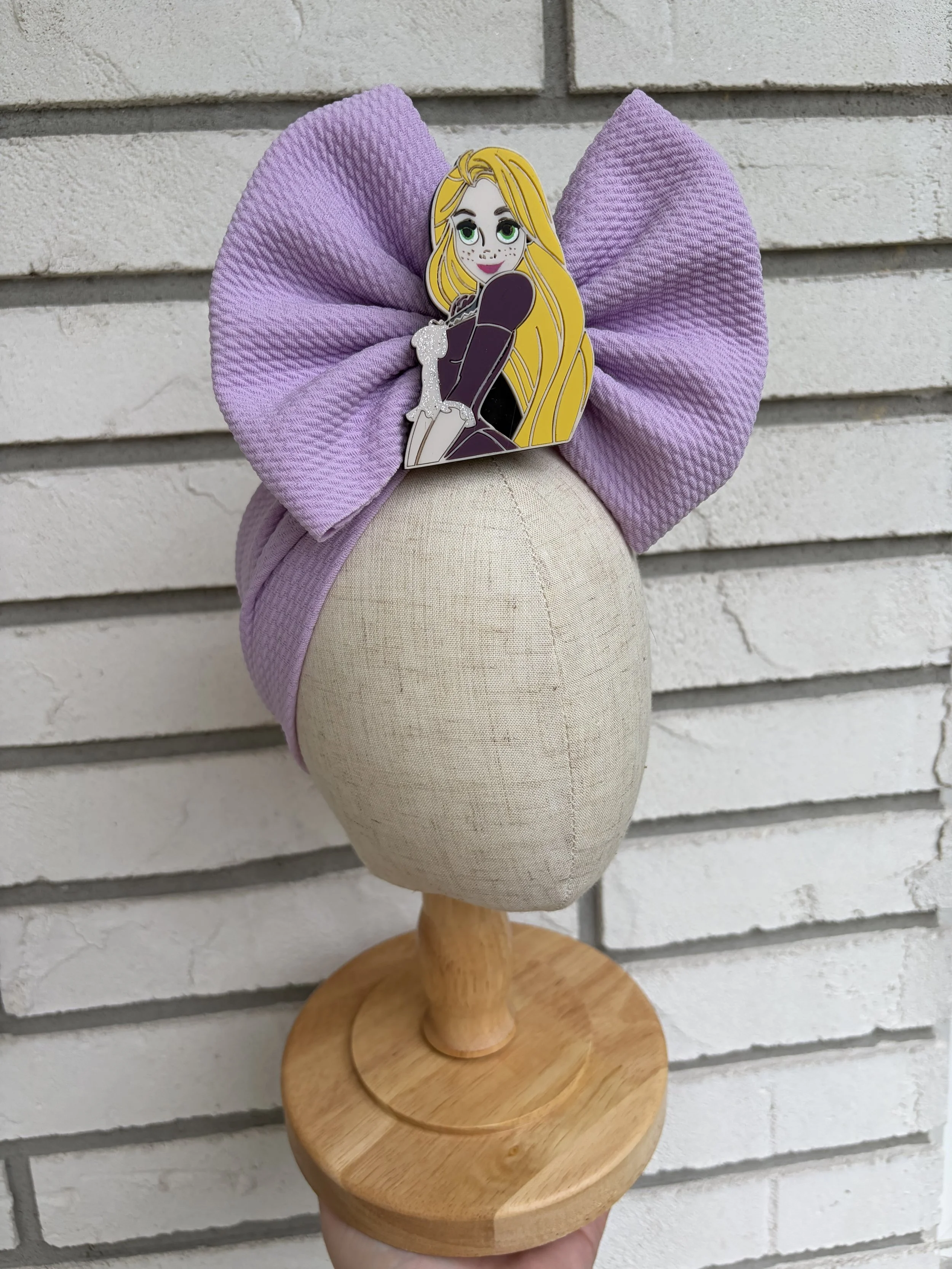 rapunzel and bow.jpeg