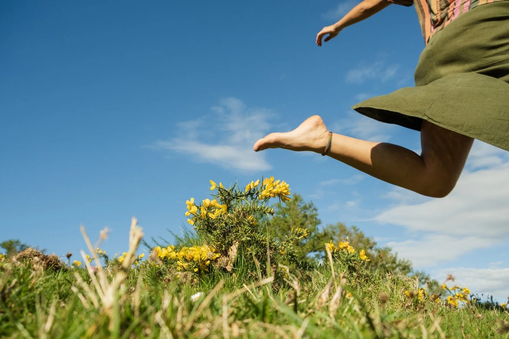 Woman jumping in nature.