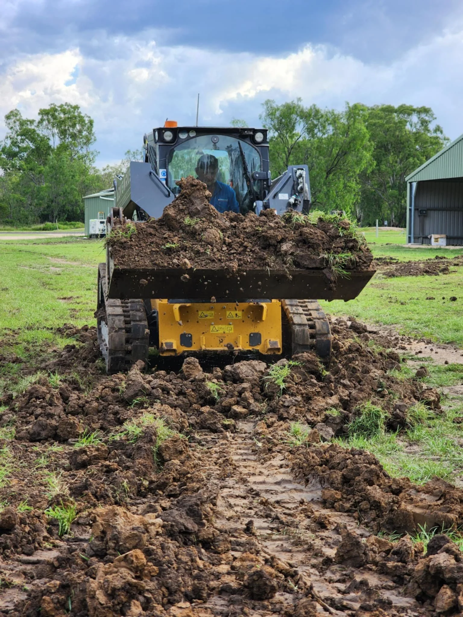 Posi Track pushing dirt