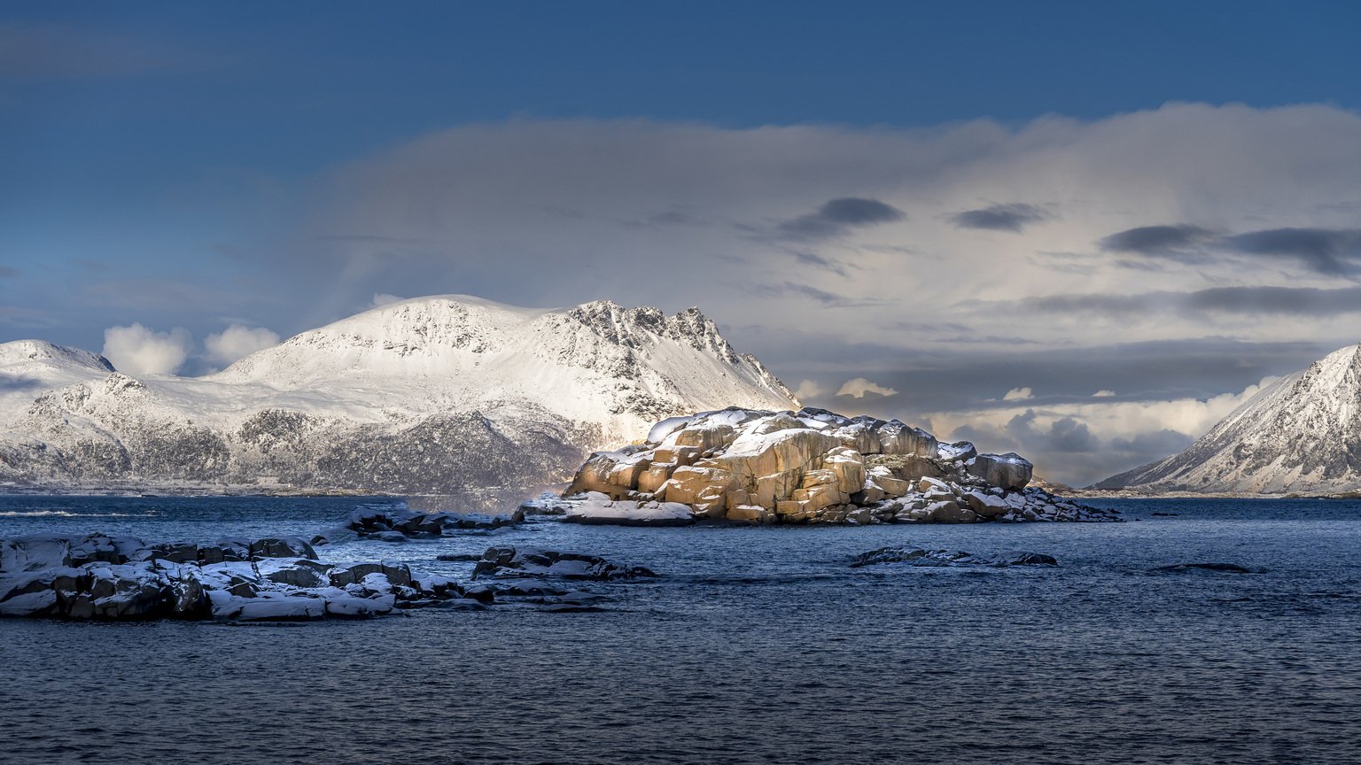 Snow-covered mountains and fjord at Lofoten, Norway landscape fine art photography