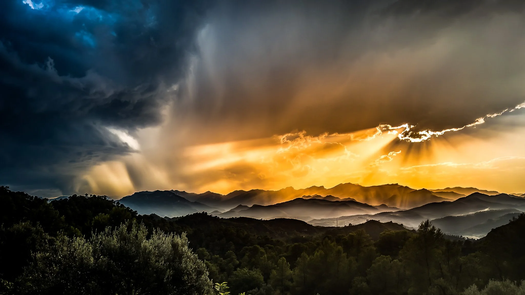 Bold statement landscape wall art print of dramatic sky over Els Ports mountains
