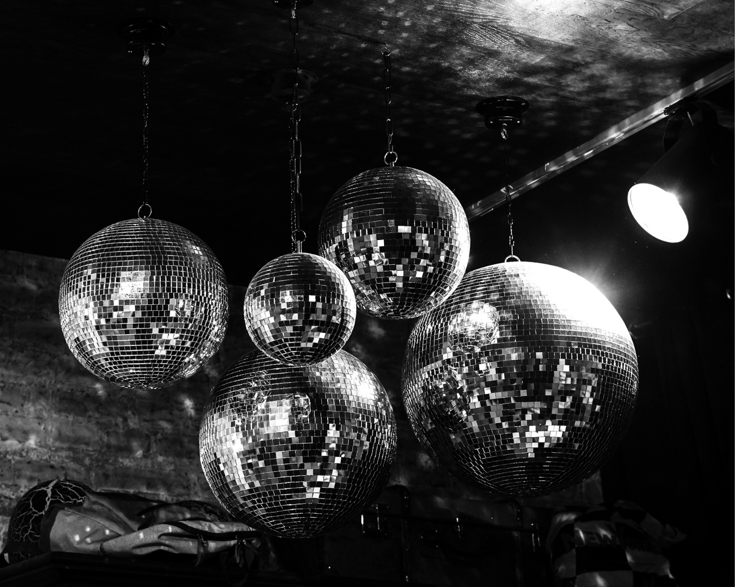 Hanging mirrored disco balls for a stylish event setup