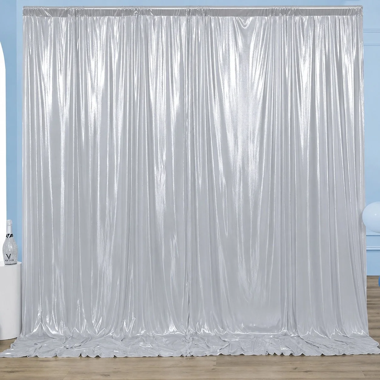 Silver draped backdrop available for Reflections Photo Booth events