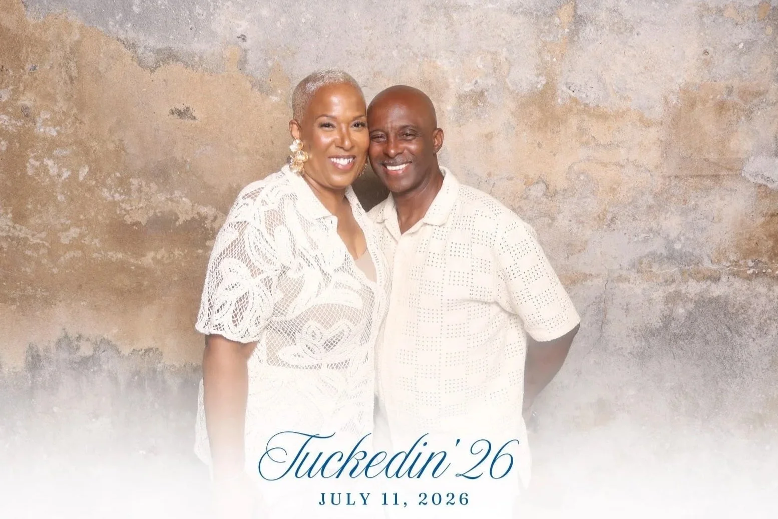Couple smiling together at Bermuda wedding event, in a personalized photo booth portrait