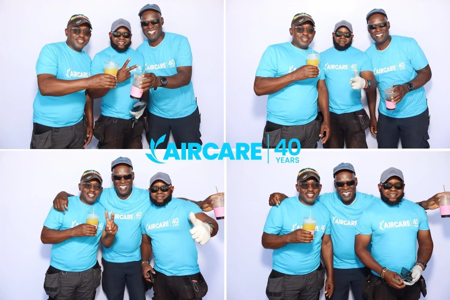 Group of guests in matching shirts posing in a custom branded photo booth layout