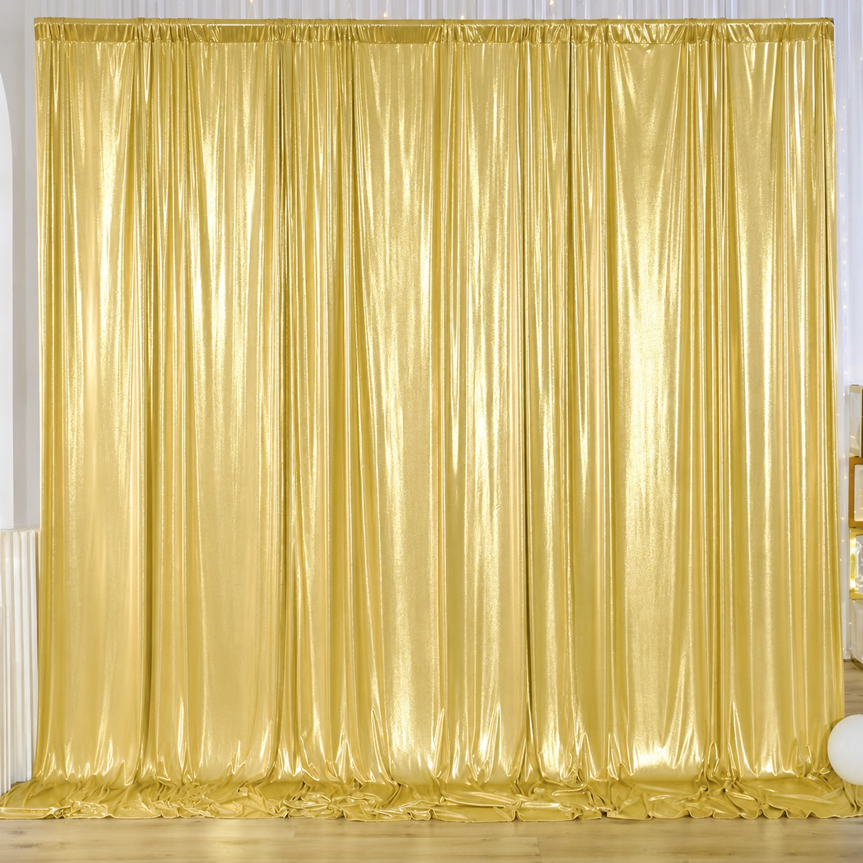 Gold draped backdrop available for Reflections Photo Booth events