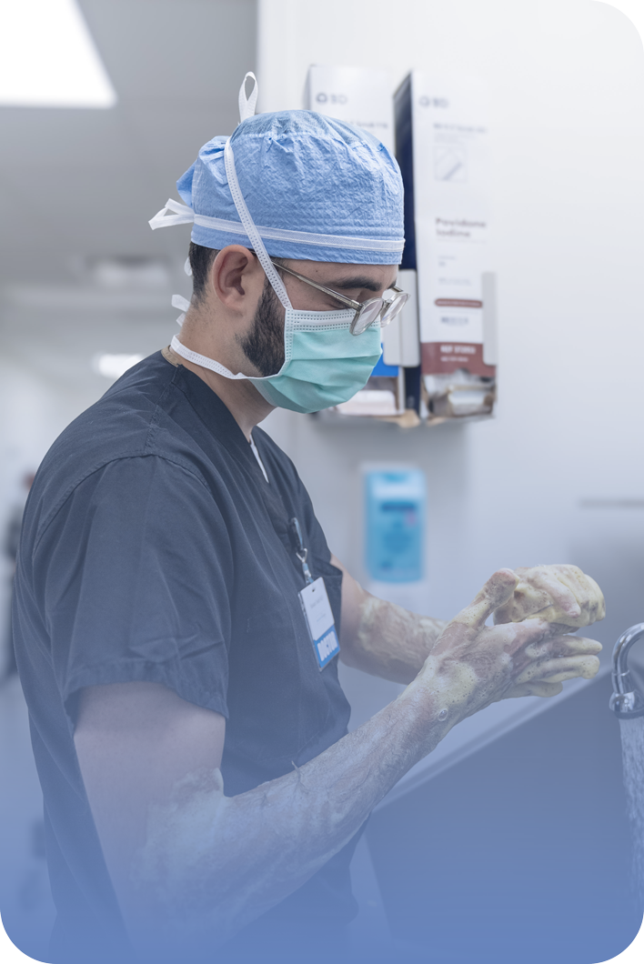 Dr. Hassan A. Fadel scrubbing in before surgery